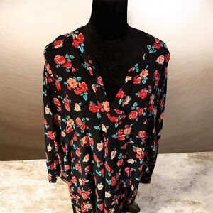 Woman Within Black Top with Floral Accents